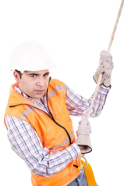 Adult man wearing safety equipment descending a rope — Stock Photo, Image