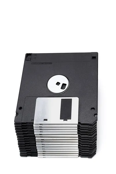 En hög med 3,5 disketter isolerad på en vit bakgrund — Stockfoto