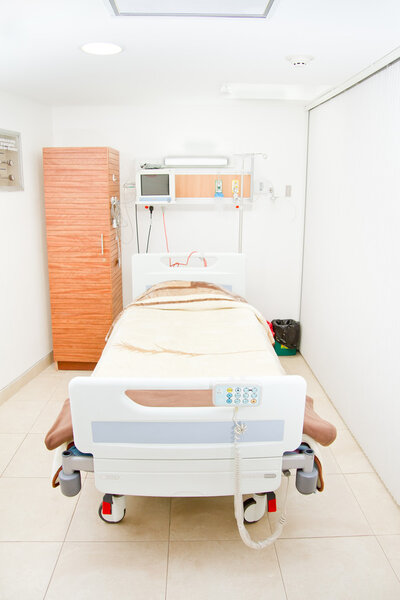 Interior of new empty hospital room.