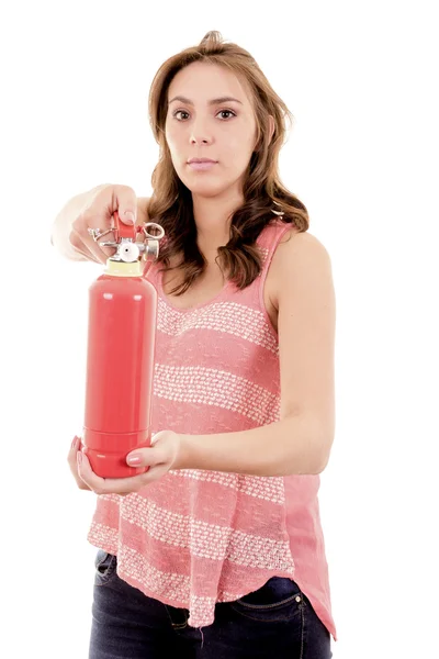 Beautiful young businesswoman, using a fire extinguisher isolated on white — Stock Photo, Image