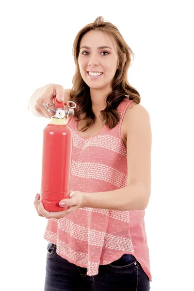 Gyönyörű fiatal üzletasszony, használ egy tűzoltó készülék elszigetelt fehér — Stock Fotó