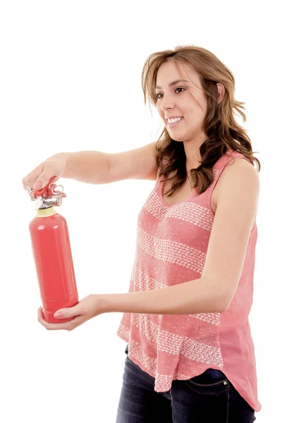 Bela jovem empresária, usando um extintor isolado em branco — Fotografia de Stock