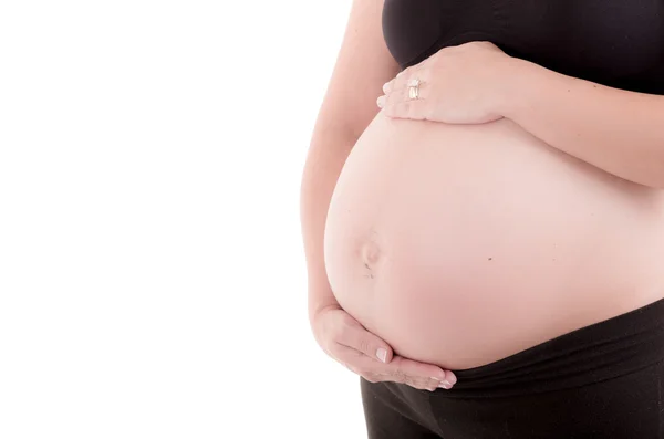 Pancia di una donna incinta ispanica — Foto Stock
