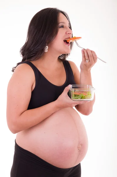 Pregnant woman and vegetable salad — Stock Photo, Image