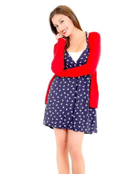 Happy Young woman in dotted dress and sweater on a white background — Stock Photo, Image