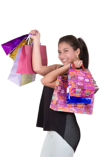 Retrato de joven mujer hispana feliz con bolsas de compras —  Fotos de Stock