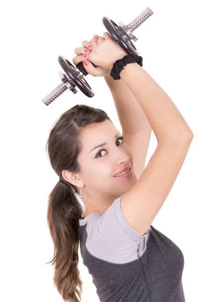 Mujer hispana juguetona haciendo ejercicio, levantando pesas — Foto de Stock