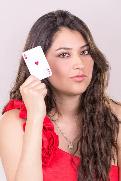 Pretty young woman gambling — Stock Photo, Image