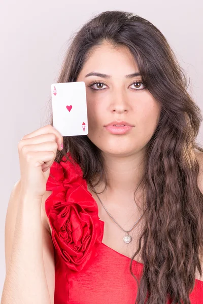 Pretty young woman gambling — Stock Photo, Image
