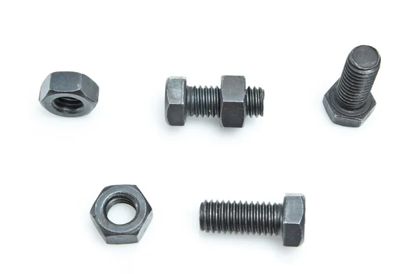 Nuts and bolts isolated on a white background — Stock Photo, Image