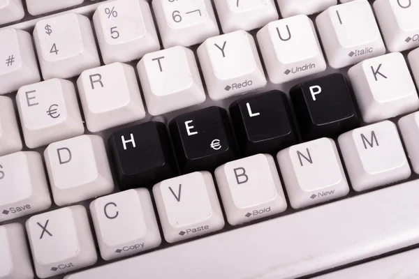 Word Help escrito con teclas negras en el teclado de la computadora . —  Fotos de Stock