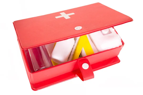 First aid kit on a white background — Stock Photo, Image