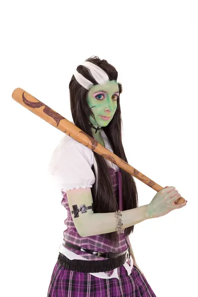 Woman in Frankenstein costume with bat — Stock Photo, Image