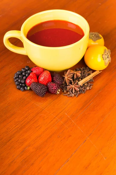 Traditional Ecuatorian dish, colada morada on yellow pot — Stock Photo, Image