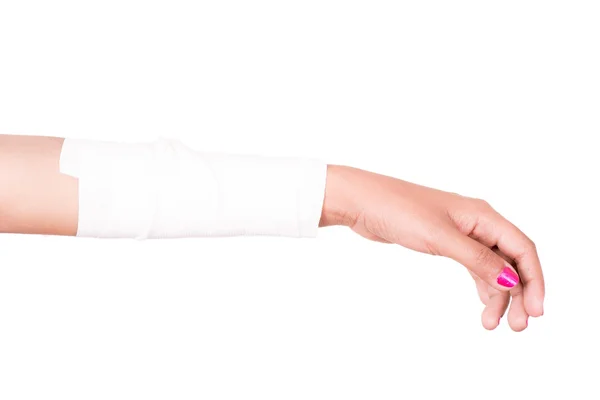 Close-up image of a white bandage wrapped on injured arm. — Stock Photo, Image