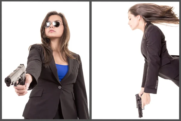 Business woman holding up her weapon — Stock Photo, Image