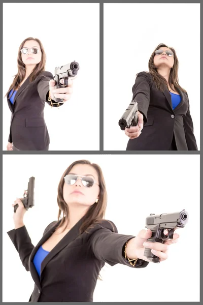 Mulher de terno com pistola — Fotografia de Stock