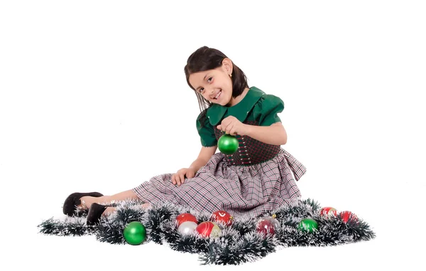 Cute girl wearing a green Christmas holiday dress — Stock Photo, Image