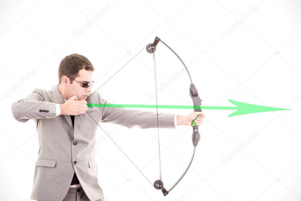 Determined businessman aiming at target, bow and arrow