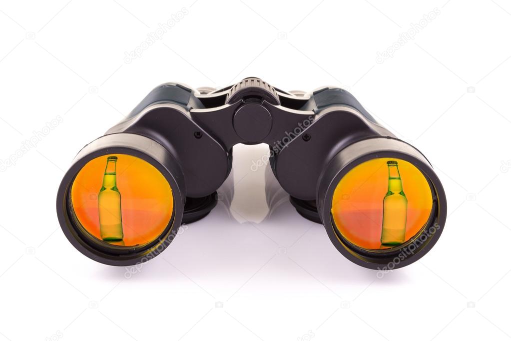 Black binoculars with beer isolated on a white background