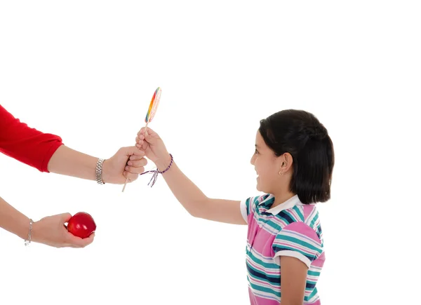 Liten spansktalande flicka med stora lollipop — Stockfoto