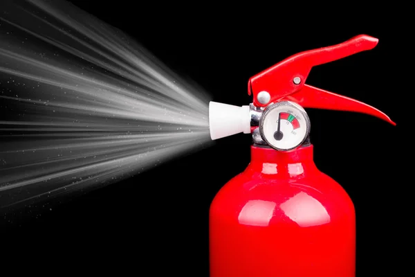 Red fire extniguisher met spray — Stockfoto