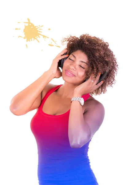 Schöne schwarze Frau mit Kopfhörer — Stockfoto