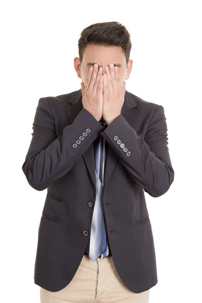 Desperate hispanic man with hand in face — Stock Photo, Image