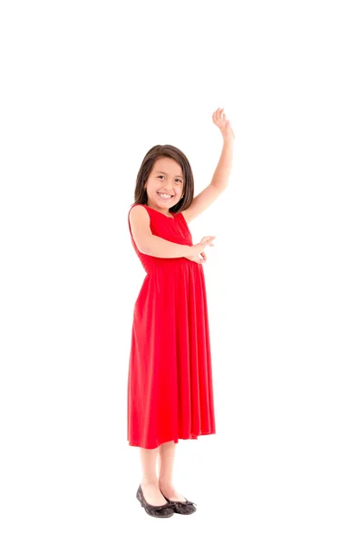 Full length portrait of a happy little girl dancing — Stock Photo, Image