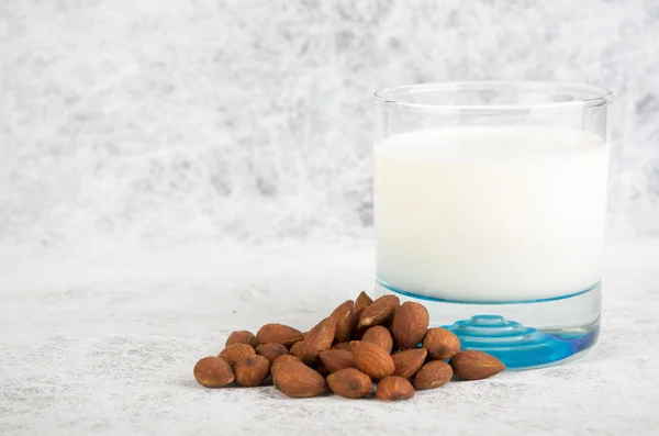 Almond milk with almonds — Stock Photo, Image