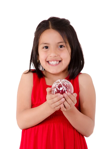 Girl holding a christmass ornament — Stock Photo, Image