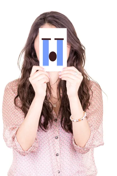 Mulher mostrando um emoticon triste na frente da cara — Fotografia de Stock
