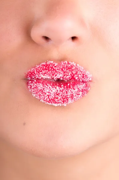 Cropped image of woman lips covered with sugar — Stock Photo, Image