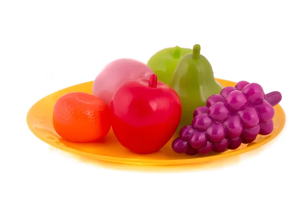 Juguete de frutas de plástico aislado en blanco — Foto de Stock