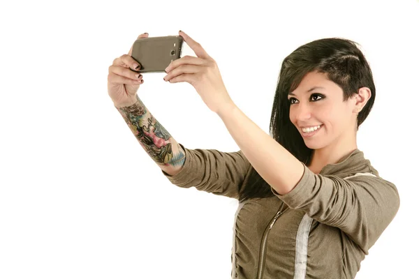 Pretty girl take a self portrait with her smart phone — Stock Photo, Image