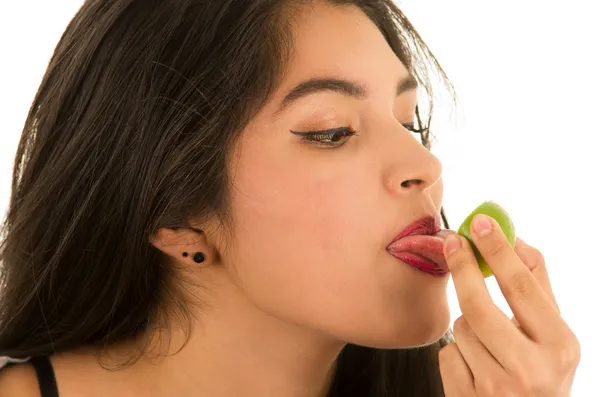 Hispanic woman taking a tequila shot — Stock Photo, Image