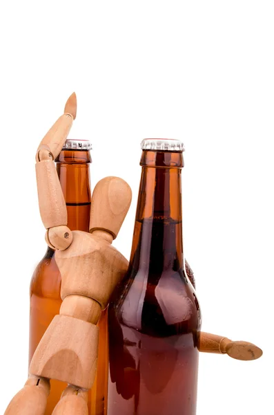 Wood model getting drunk with beer — Stock Photo, Image