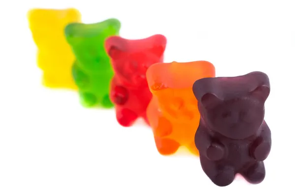 Σειρά από πολύχρωμα gummy αρκούδες σε απομονωμένες άσπρο φόντο — Φωτογραφία Αρχείου