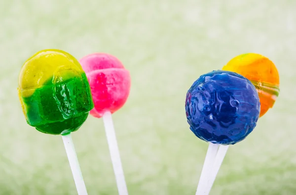 Lollipops 中抽象的背景下的各种颜色 — 图库照片