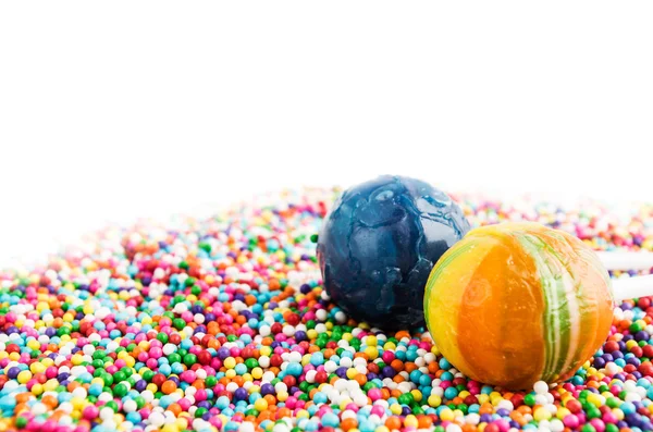 Arka planda sprinkles ile pop kek — Stok fotoğraf