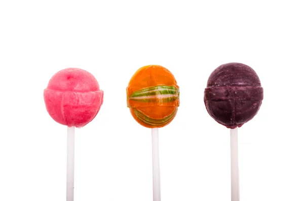 Барвисті льодяники цукерки на паличці — стокове фото