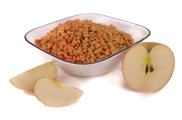 Desayuno con cereales de chocolate en un tazón con una manzana —  Fotos de Stock
