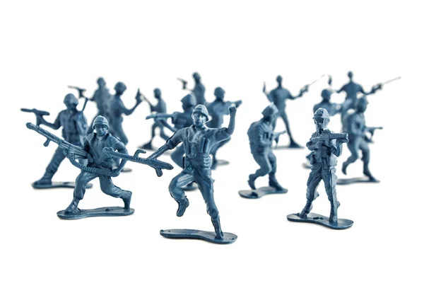 Speelgoed soldaten witte achtergrond — Stockfoto
