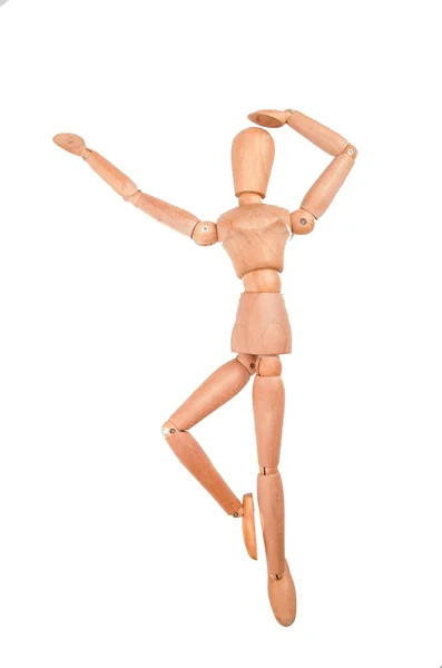 Dançando figura modelo de madeira em um fundo branco — Fotografia de Stock