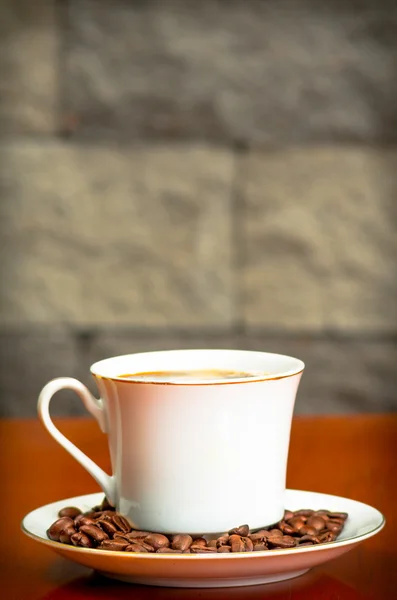 Taza de café con semillas — Foto de Stock