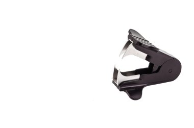 Staple remover on a white background clipart
