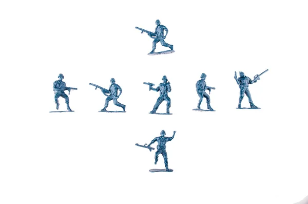 Speelgoed soldaten witte achtergrond — Stockfoto