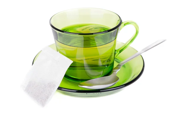 Zelený čaj v transparentní šálku izolovaných na bílém — Stock fotografie