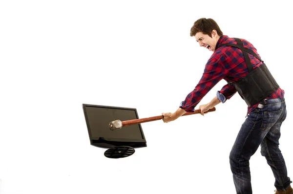 Homme avec marteau cassant une tv lcd — Photo