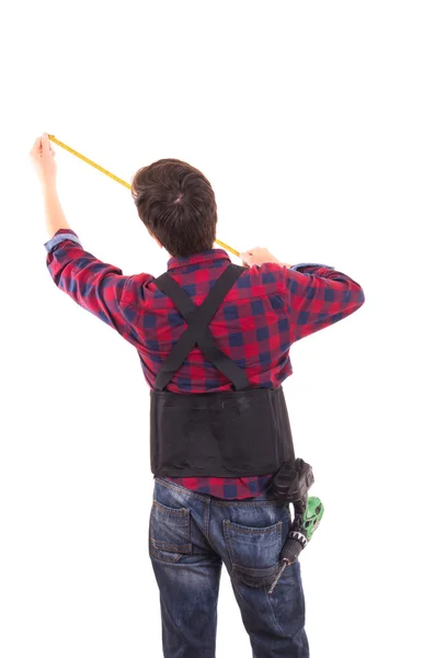 Man with measuring tape handyman on white background — Stock Photo, Image